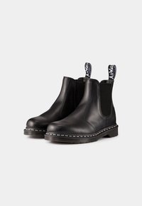 Dr. Martens Šněrovací kotníkové boty - black