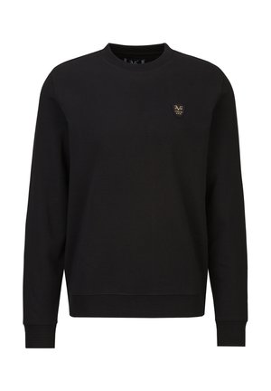 Schwarzes langärmliges Sweatshirt mit Rundhalsausschnitt und einem kleinen gold-schwarzen Emblem auf der linken Brust.