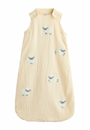 Cream-colored baby sleeping bag with snap closures on shoulders and embroidered playful white sheep scattered on front.