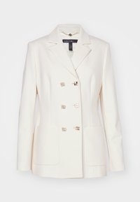 Double-breasted cream blazer made of smooth fabric. Features metallic square buttons and two front pockets. Notched collar design.