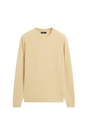 Beige knit sweater with long sleeves, crew neck, and ribbed hem. Soft texture with a smooth finish, suitable for casual layering.