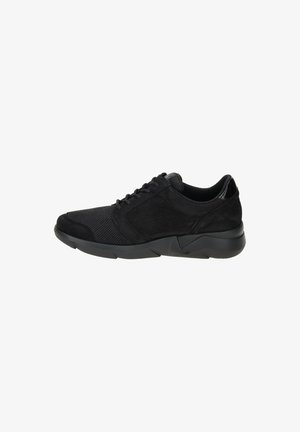 Black sneakers featuring a mix of suede and mesh materials, a rounded toe, lace closure, and a thick rubber sole with textured detailing.