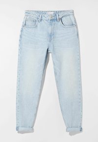Light blue denim jeans with a tapered shape, featuring a button closure, five pockets, and rolled hems. Textured fabric with slight fading.