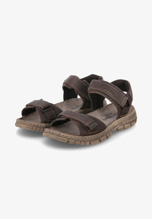 Brown leather sandals with adjustable Velcro straps, contoured footbeds, and textured rubber soles. Lightweight design for comfort.