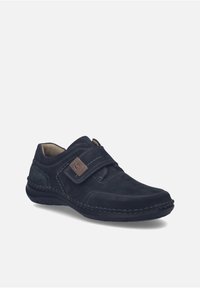 Scarpe scure in suede blu con cinturino a strappo, cuciture a contrasto, colletto imbottito e suola in gomma per una maggiore aderenza e comfort.