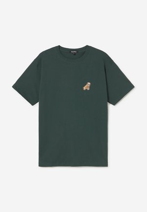Dark green short-sleeve t-shirt with a small embroidered sitting bulldog on the left chest, round neckline, and relaxed fit.
