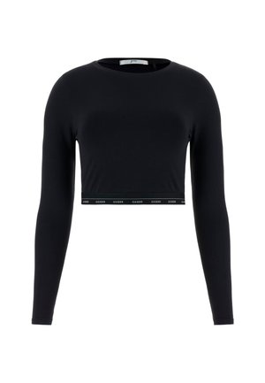 Crop top nero a maniche lunghe realizzato in tessuto morbido, con scollatura rotonda e una fascia in vita con il dettaglio del logo "GUESS" in bianco.