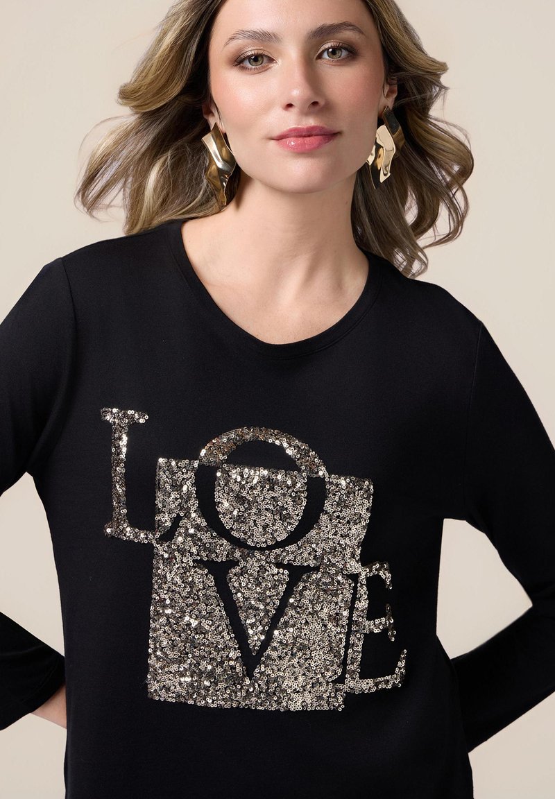 Oltre CON RICAMO IN PAILLETTES Maglietta a manica lunga nero