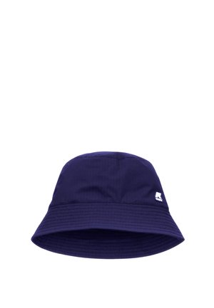 Chapeau seau bleu marine en tissu léger avec une texture côtelée. Il présente un large bord et une petite étiquette logo sur le côté.