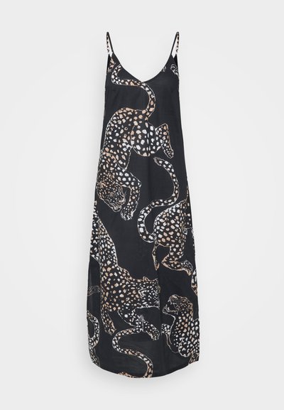 Vestido preto com estampa de leopardo em tons de castanho, branco e preto. Alças finas, design leve e fluido, comprimento até os joelhos e tecido leve.