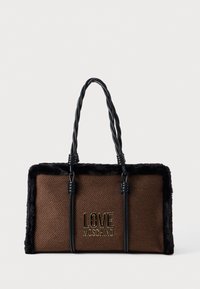 Brown woven tote bag with black faux fur trim, twisted black handles, and gold "LOVE MOSCHINO" logo on the front.
