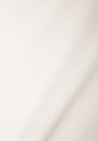Beige, leichtes Baumwollgewebe. Glatte Textur mit einem subtilen gerippten Muster. Sauberes, minimalistisches Design, das sich für verschiedene Anwendungen eignet.