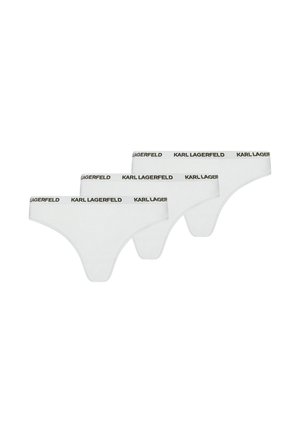 Drie witte string-onderbroeken met een zwarte "KARL LAGERFELD"-logo op de tailleband, gerangschikt in een verspringende rij.