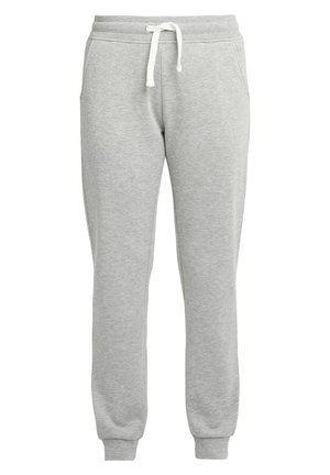 Pantaloni da jogging in cotone grigio con vita elastica, cordino regolabile, tasche laterali e polsini aderenti alle caviglie. Texture liscia.