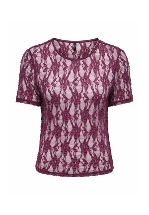 Top en dentelle violette à manches courtes et col rond avec motif floral, tissu semi-transparent et coupe régulière.