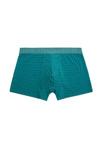 Calzoncillos tipo bóxer en color azul verdoso con un pequeño patrón de diseño oscuro y una cinturilla elástica de marca que dice "YSABEL MORA."