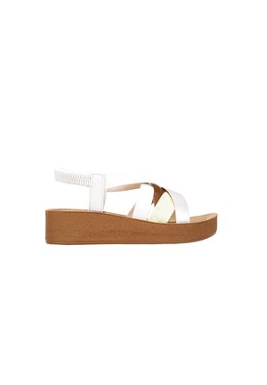 CON ELÁSTICO - Sandalias con plataforma - beige