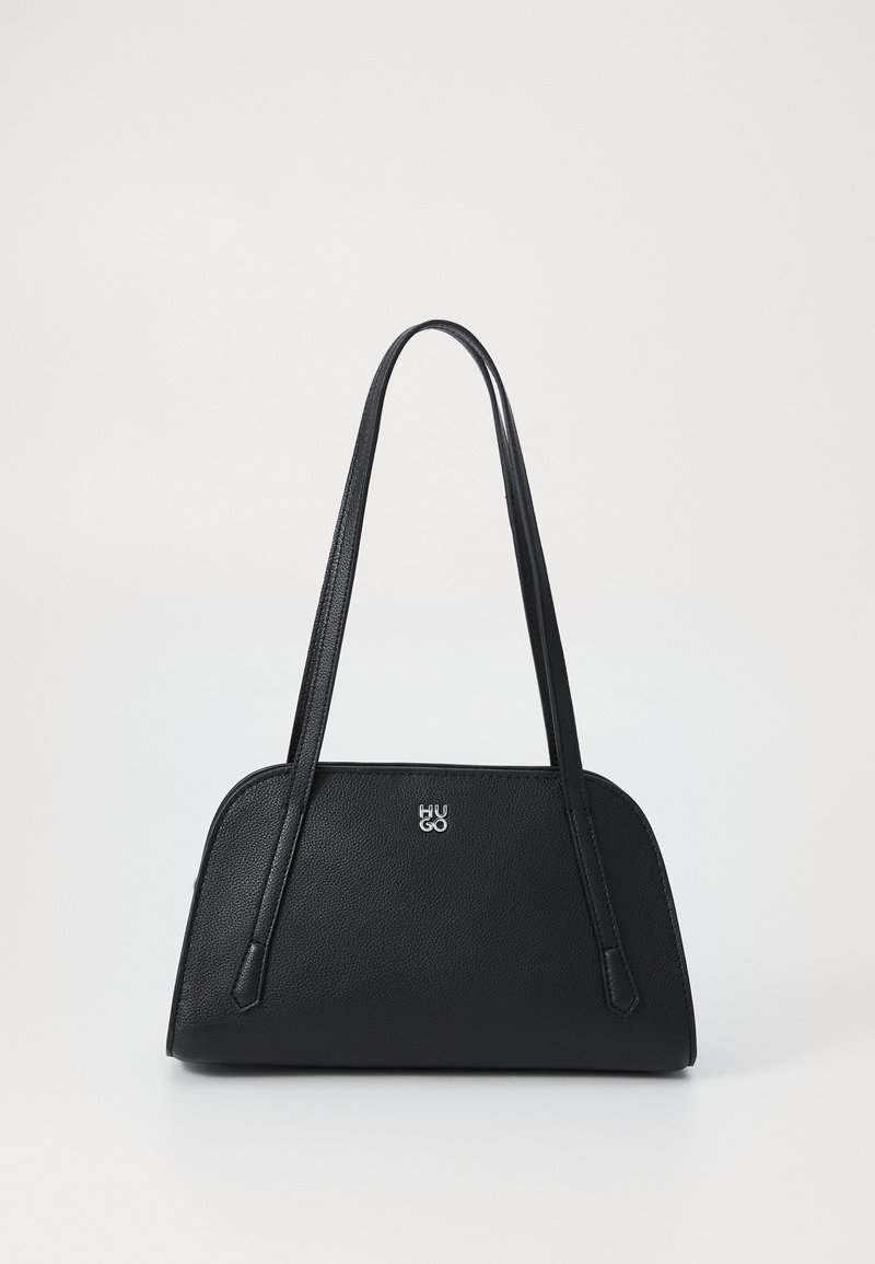 Black leather handbag with a rounded shape, dual handles, embossed logo, and textured surface. Features a minimalist design.