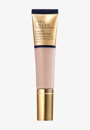 Tubo beige con dettagli in oro e blu navy, etichettato "Estée Lauder Futurist Hydra Rescue." Contiene trucco idratante e SPF 45.