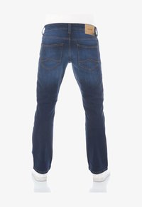 Seleccionado, dark blue denim