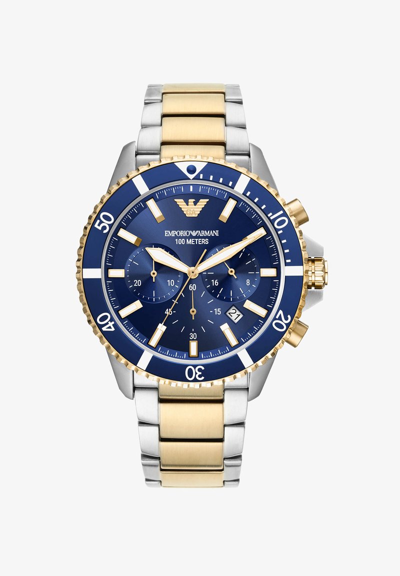 Montre-bracelet en métal or et argent avec un cadran bleu, fonctions chronographe, accents dorés, marqueur de temps écoulé et indicateur de résistance à l'eau.