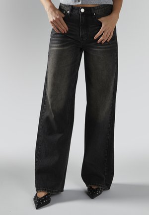 Jeans a zampa - dirty black