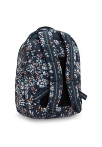Mochila de tela negra con un patrón floral en blanco, naranja y azul claro. Cuenta con correas para los hombros acolchadas y bolsillos laterales.