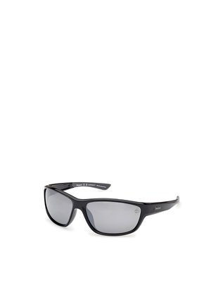 Schwarze Kunststoff-Sonnenbrille mit einem rundumgehenden Design, grauen Gläsern und gebogenen Bügeln. Enthält ein Logo an der inneren Seite des Bügels. Mattes Finish.