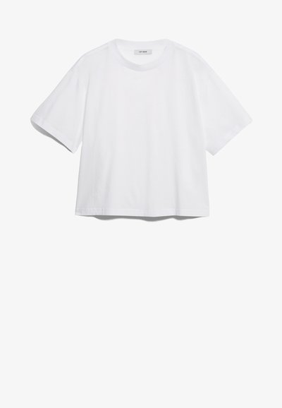 Valkoinen puuvillapaita, jossa on lyhyet hihat, pyöreä kaula-aukko, rento istuvuus ja ei näkyviä kuvioita tai graafisia elementtejä. Sujuva pinta ja yksinkertainen muotoilu.