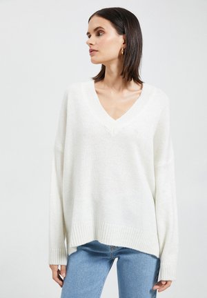- Sweter