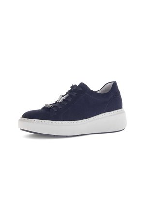 Navy suede sneaker with white platform sole, featuring lace-up design and decorative hardware on the laces. Smooth inner lining.