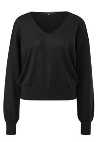 Zwarte cropped trui met een brede V-hals, verlaagde schouders en lange mouwen. Gemaakt van een zachte stof, met een geribde onderrand en manchetten.