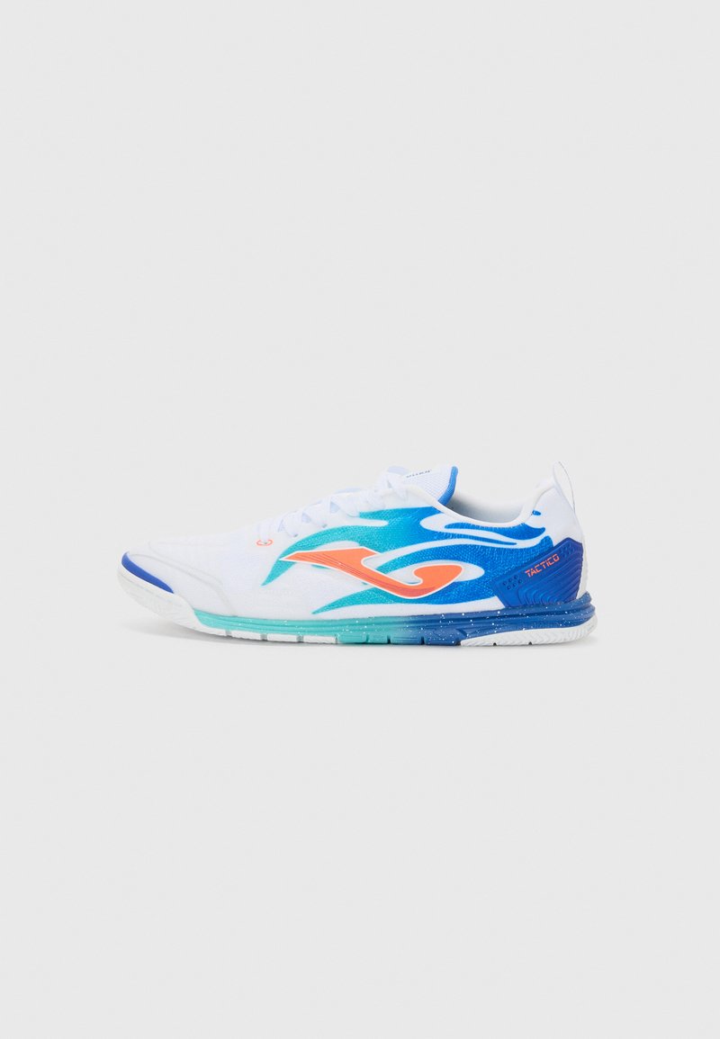 White athletic shoe with blue and orange wave patterns, lace-up design, and a textured sole featuring blue and green accents.