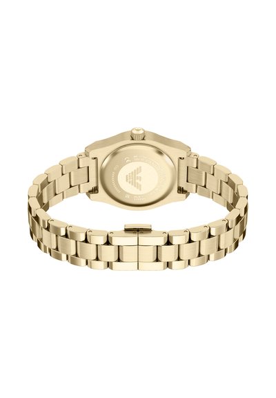 Gold-tone metal watch with an octagonal case, brushed texture, and a link bracelet design. Includes a crown and engraved back detail.