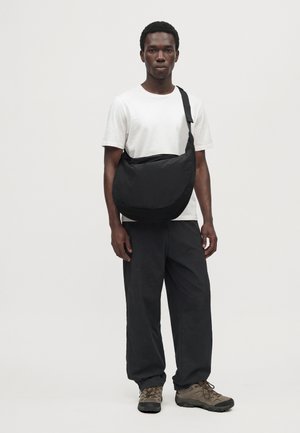 ARKK Copenhagen, CORE SLING BAG UNISEX - Sac bandoulière - black