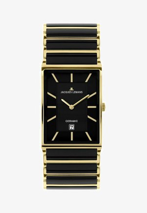 Sort keramisk ur med en rektangulær guldfarvet metode, sort urskive, guld timemarkører og en datovisning i et rektangulært vindue.