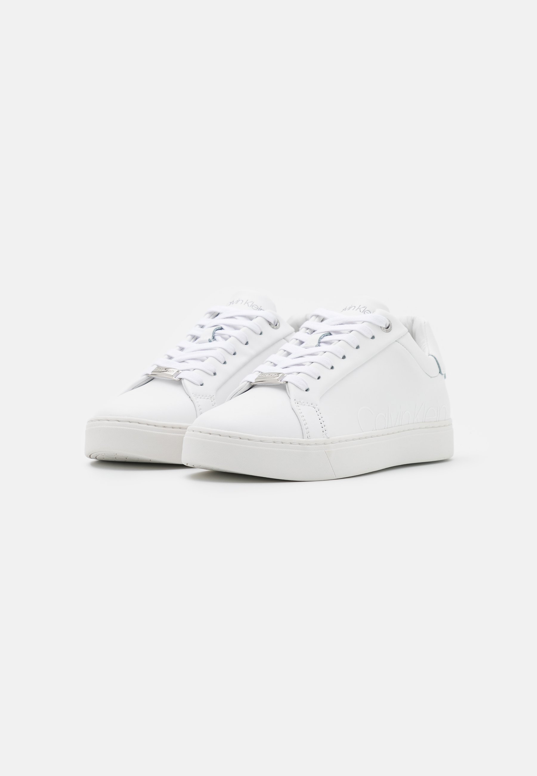 triple white trainers