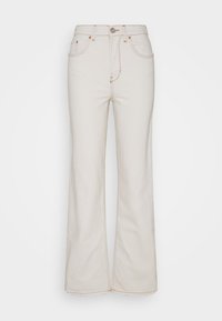 Jeans de perna larga em creme, feitos de denim, com costuras contrastantes e fecho de botão. Design de cintura alta com bolsos frontais.