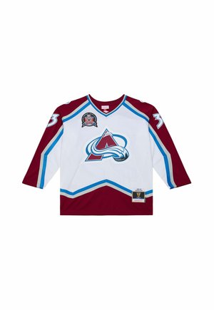 White and burgundy hockey jersey with blue accents, a mountain logo on the front, and the number 33 on the sleeves.