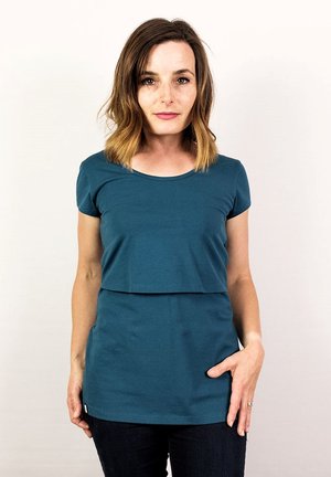 Eco Viskose Cross Over Umstands- und Stilltop berry