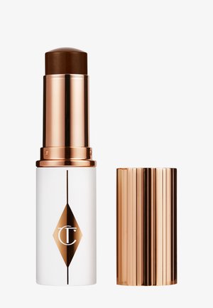 Charlotte Tilbury, UNREAL SKIN SHEER GLOW TINT - Fond de teint - 17_deep