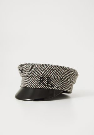 Black and white herringbone-patterned cap with black glossy visor and embroidered black "XA" letters on the front side.