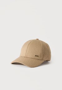 Избран, brown overflow