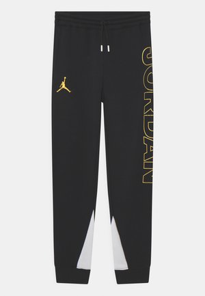 HOLIDAY SHINE PANT - Tracksuit bottoms - black