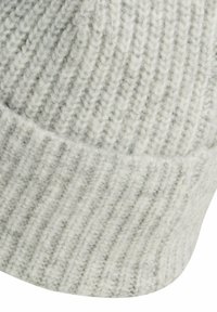 Gray knitted beanie made from soft wool, featuring a ribbed texture and a folded cuff at the bottom for added warmth.