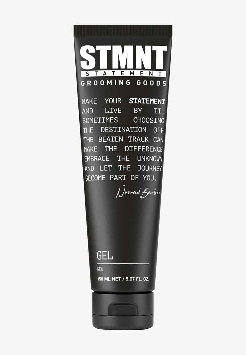 Tubo squeeze nero con testo bianco, che lo etichetta come un gel da 150 ml di STMTN Grooming Goods. Il testo include il marchio e i dettagli del prodotto.