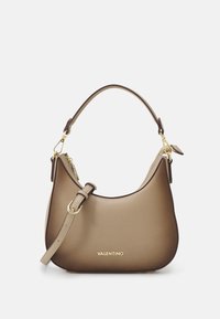 Brown leather handbag with a curved silhouette, a top handle, and an adjustable strap. Features gold hardware and embossed logo detail.