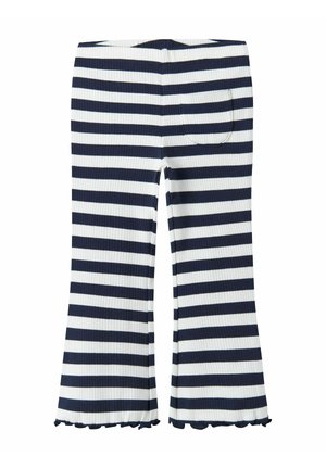 Ribbed flared pants in navy and white stripes. Features a back pocket and scalloped hem detailing. Made from textured fabric.