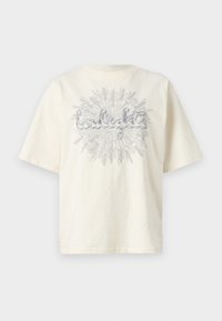 Cremefarvet bomulds T-shirt med korte ærmer, prydet med et sølvglitrende grafisk design af ordet "twilight" i et solstrålemønster.