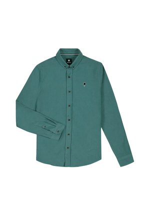 Camicia verde a maniche lunghe con bottoni, colletto con bottoni e piccolo logo a forma di albero sul petto sinistro.